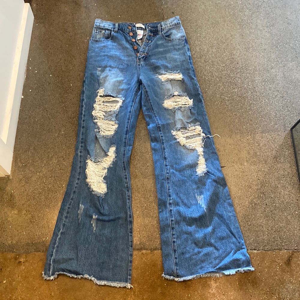 Vibrant flare high waisted ripped jeans